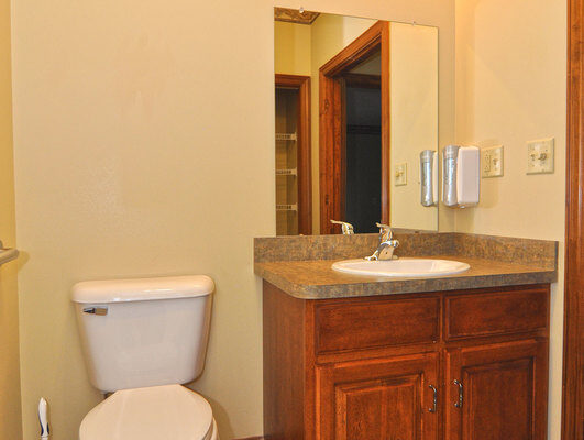 Resident Bathroom With A Sink And A Mirror